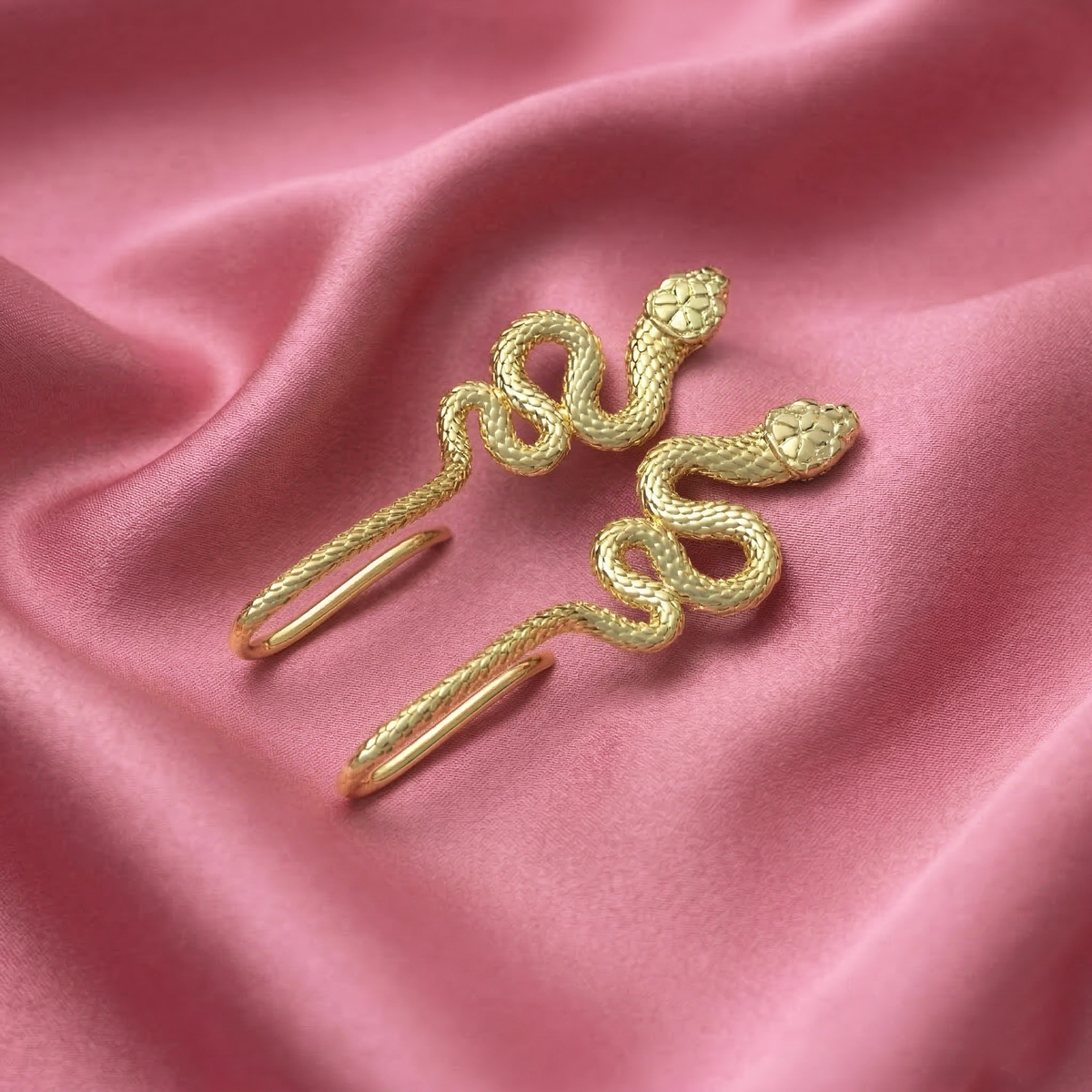 Aretes de serpiente en plata 950 y baño de oro 18k
