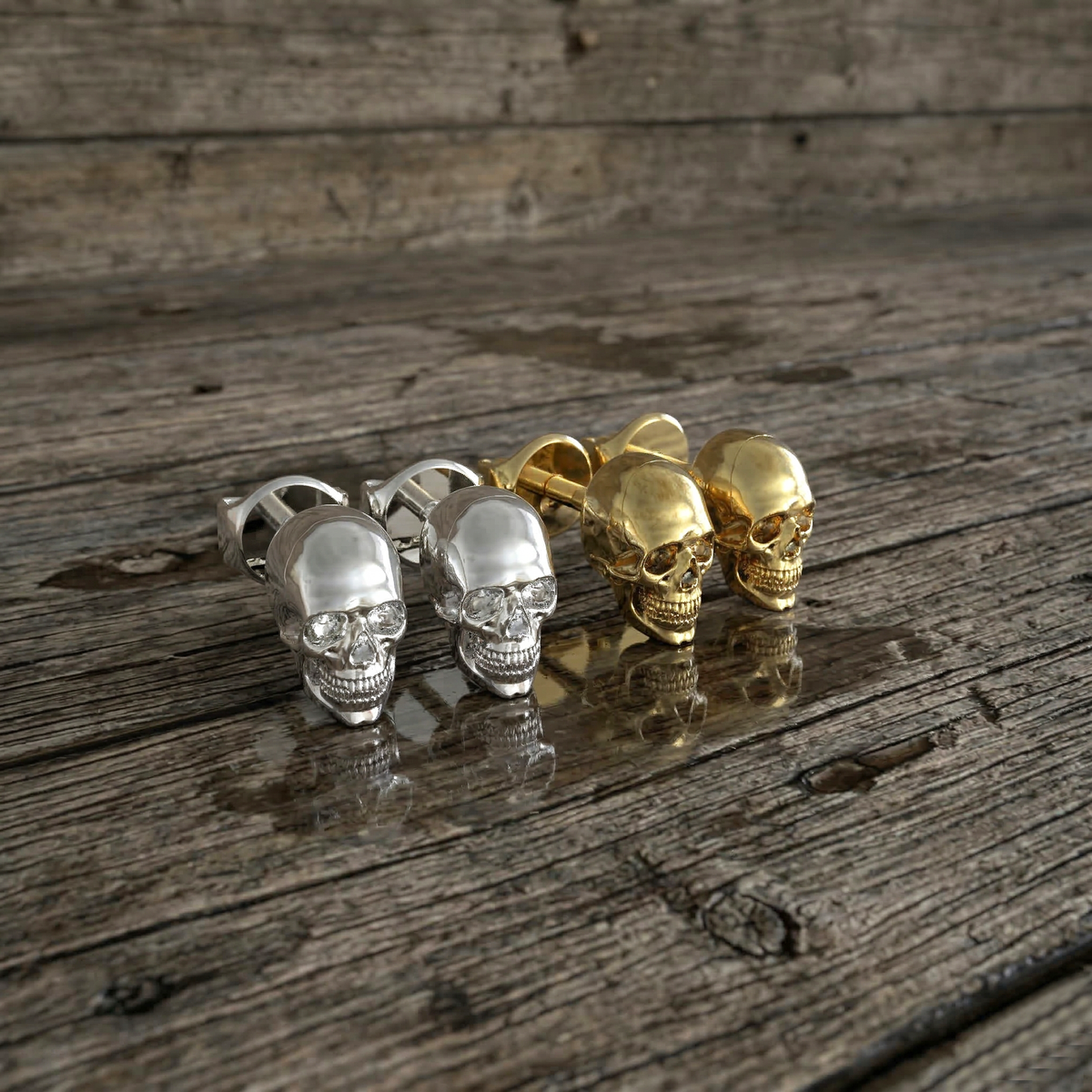 Aretes de calavera en plata 950 y baño de oro 18k – Osiris