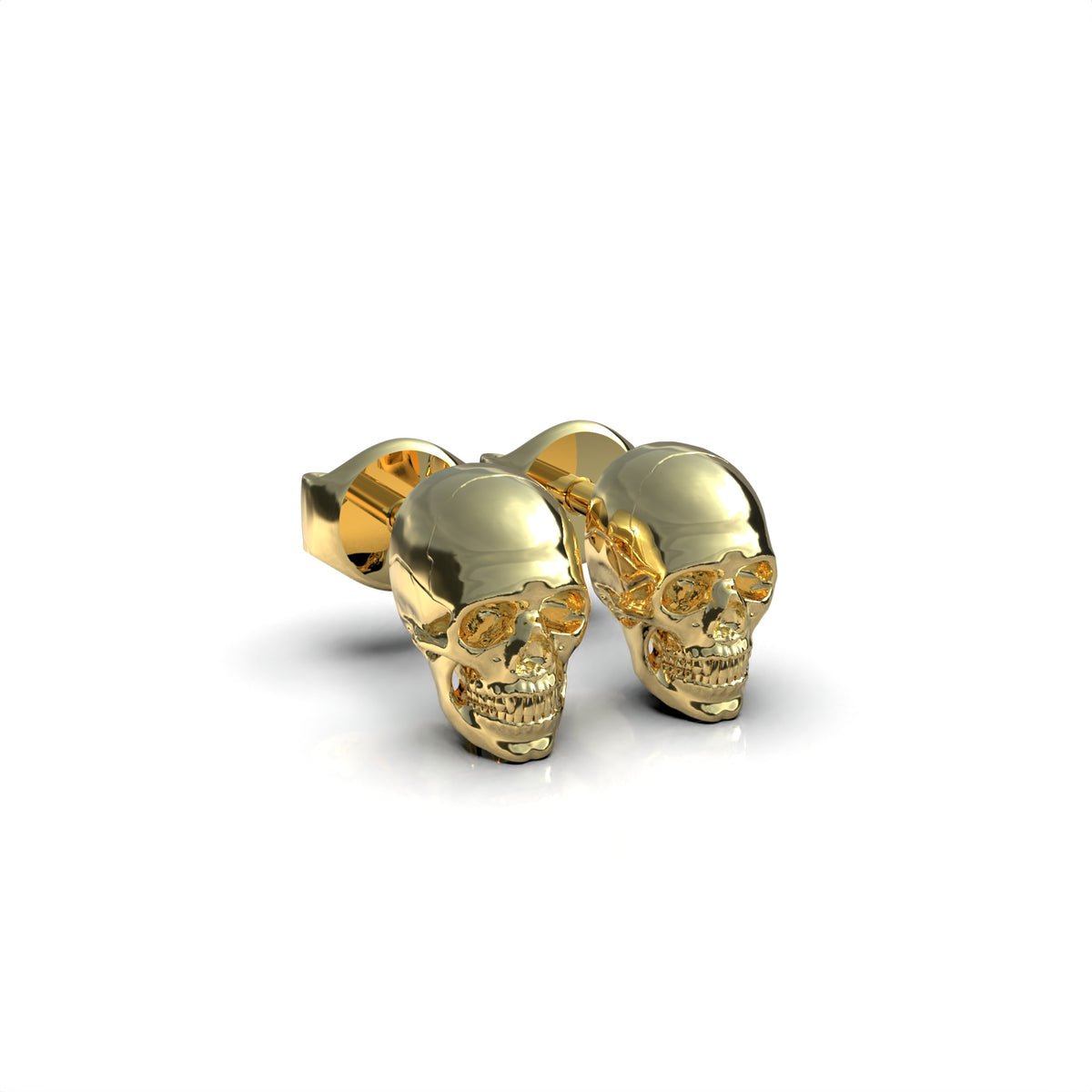 Aretes de calavera en plata 950 y baño de oro 18k – Osiris