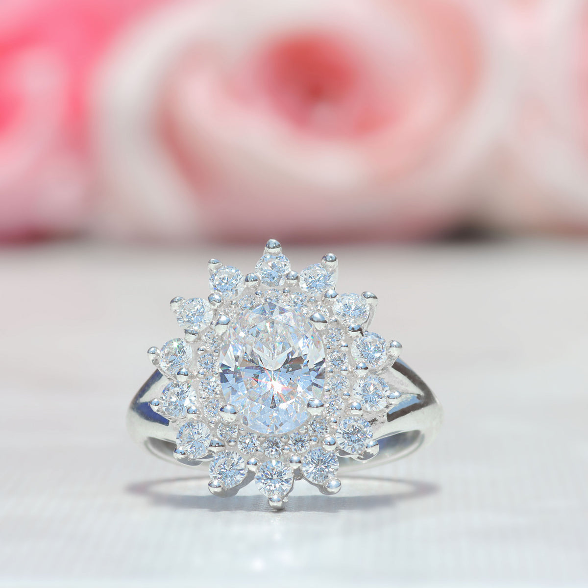 Anillo roseta con piedra central oval en plata 950