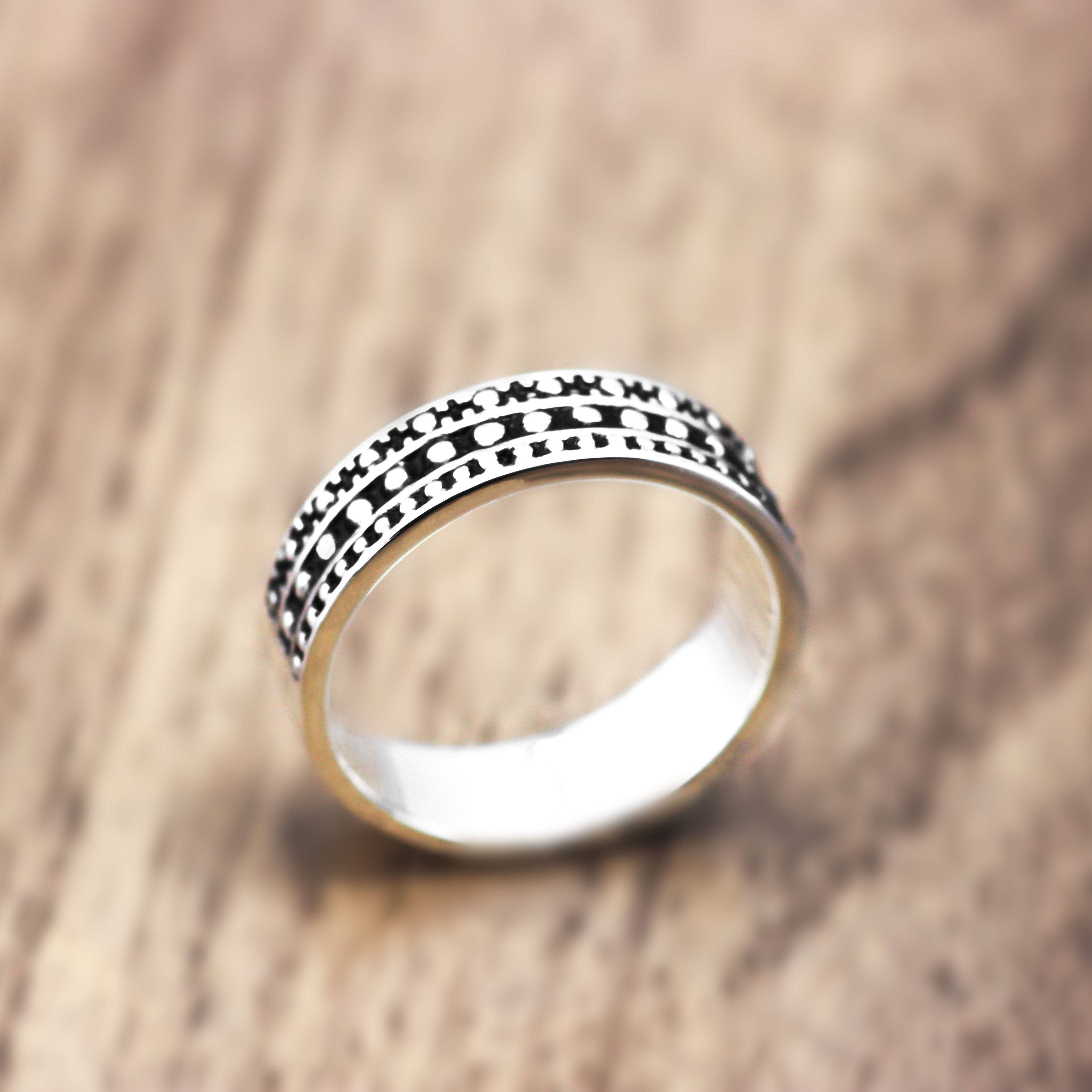 Ring with circles and relief