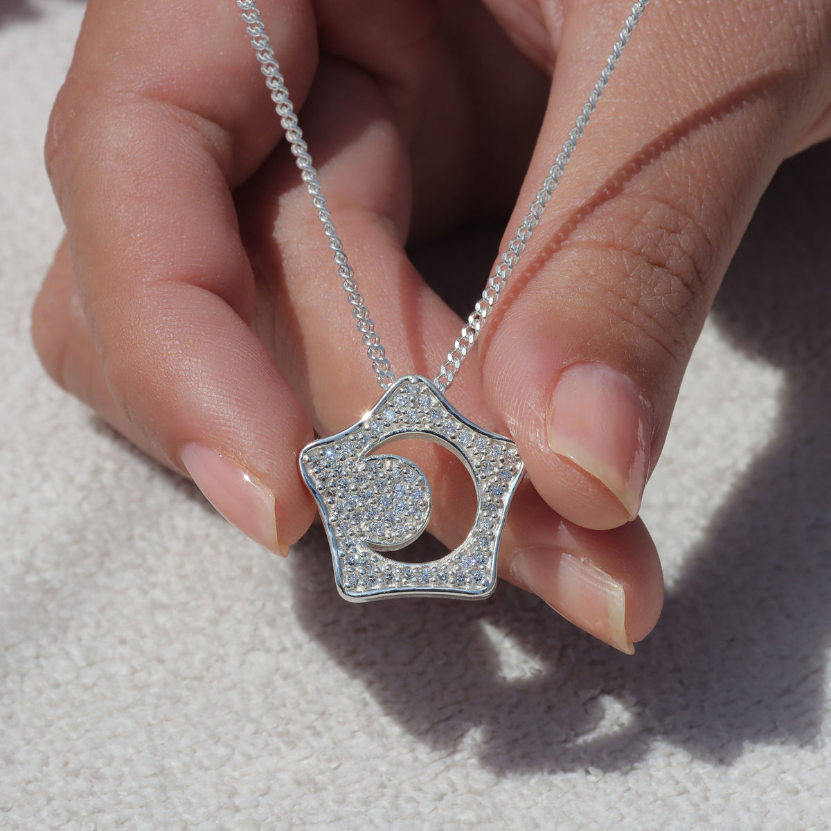Collar de estrella y luna en plata 950