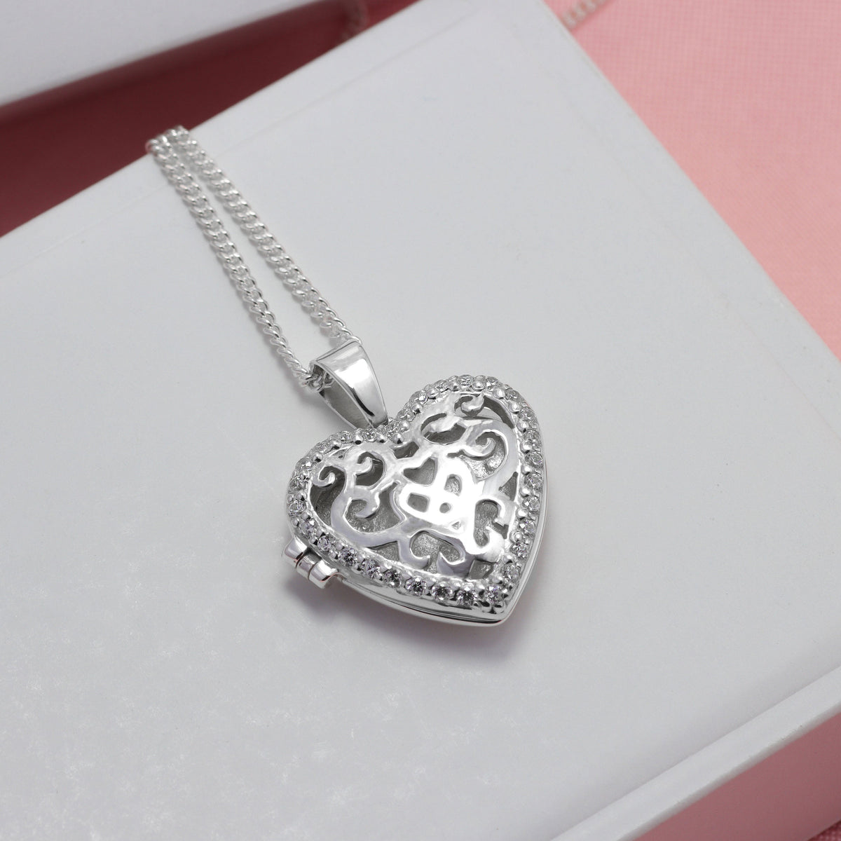 Collar relicario curvas del corazón en plata 950