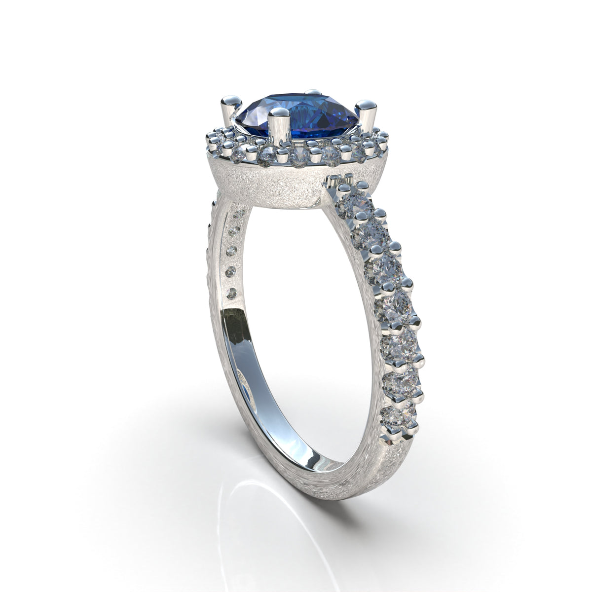 Anillo halo con piedra central en plata 950