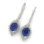 Cargue la imagen en el visor de la galería, Arete oval con corte circular