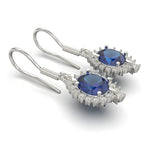 Cargue la imagen en el visor de la galería, Arete oval con corte circular