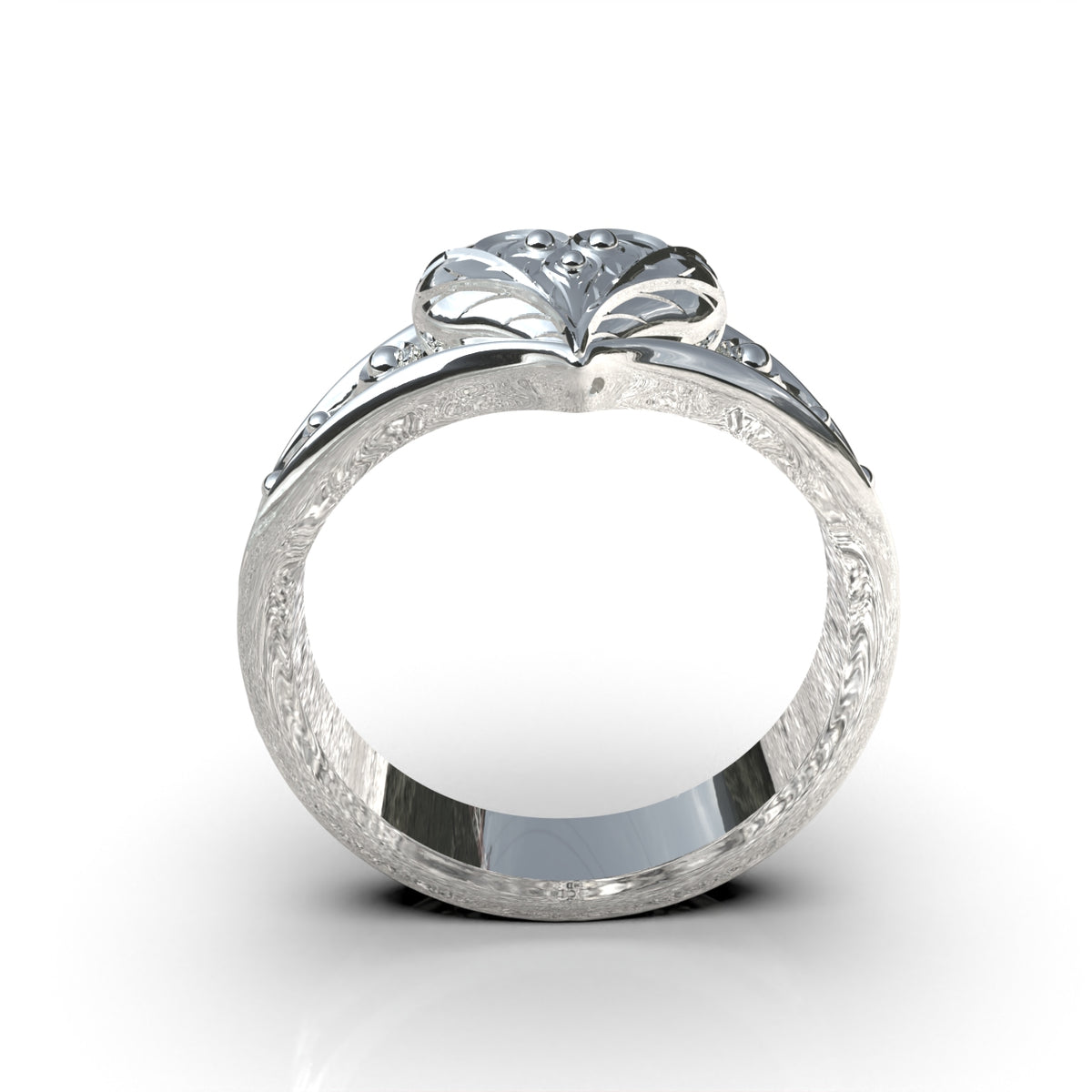 Anillo corazón con flor en plata 950