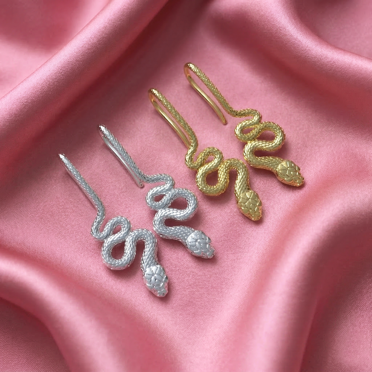 Aretes de serpiente en plata 950 y baño de oro 18k