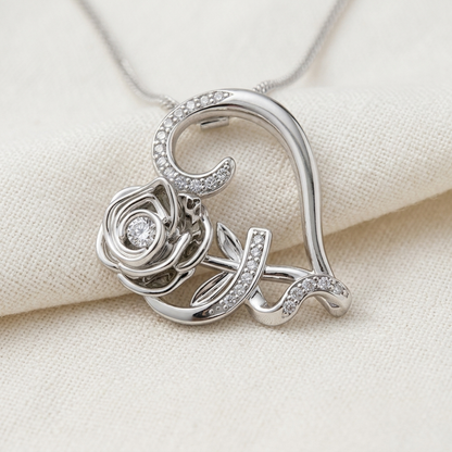 Collar de rosa y corazón en plata 950