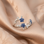 Anillo de flor y ramas con piedra en plata 950