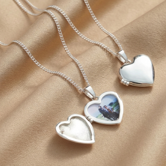 Collar relicario de corazón en plata 950