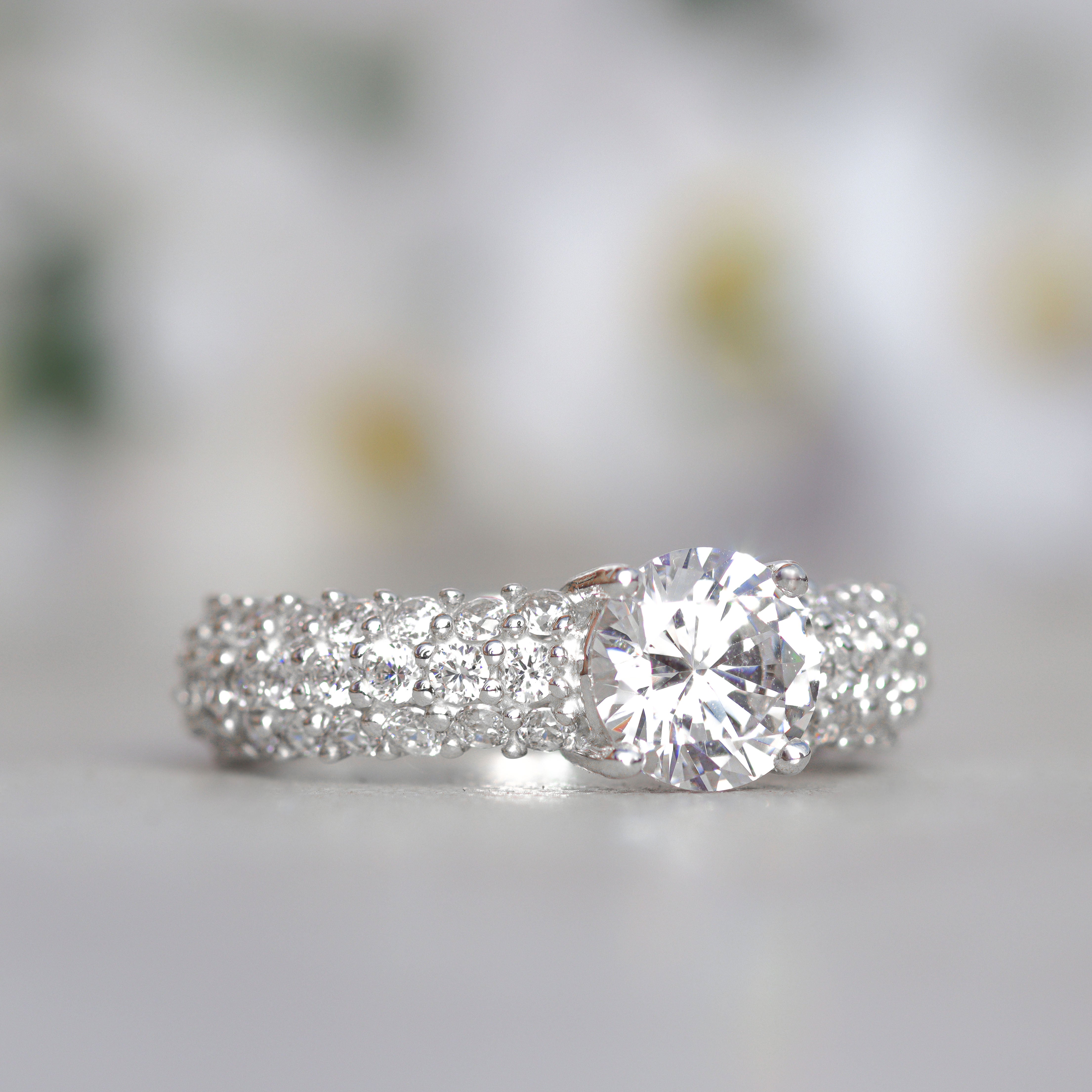 Ring with three rows of circular cut
