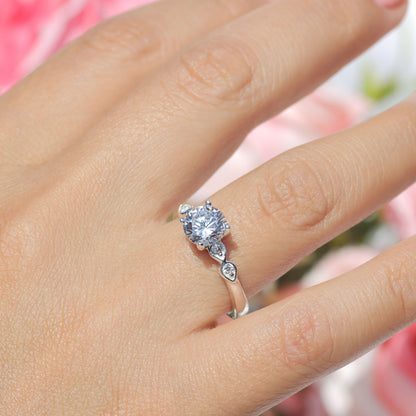 Anillo de gotas con piedra redonda en plata 950