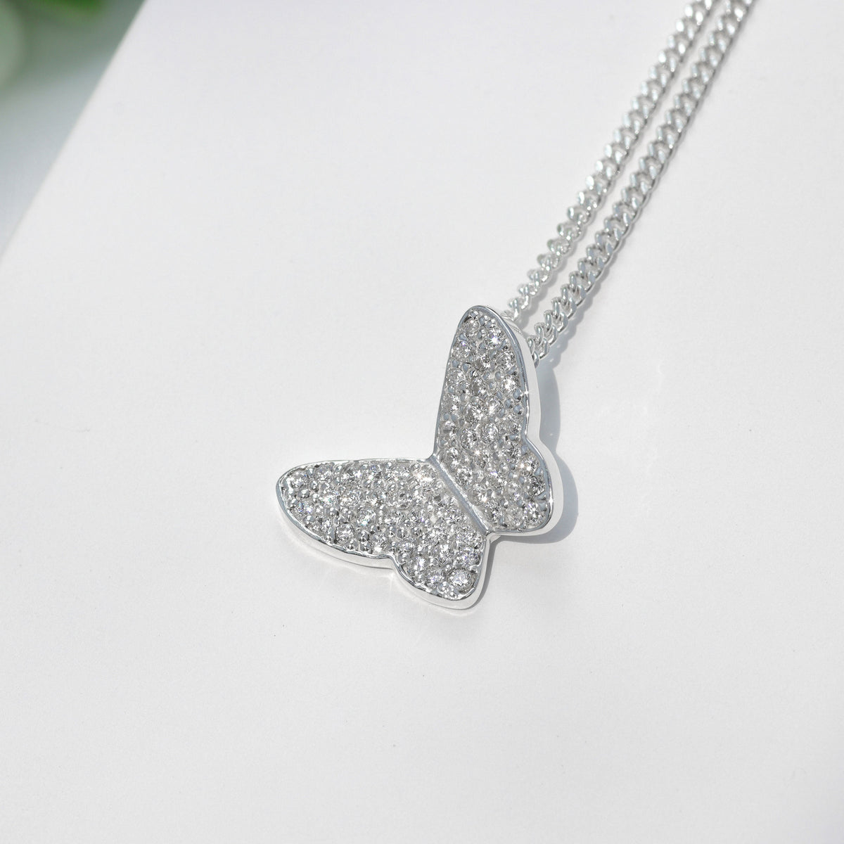 Butterfly necklace with circular cut