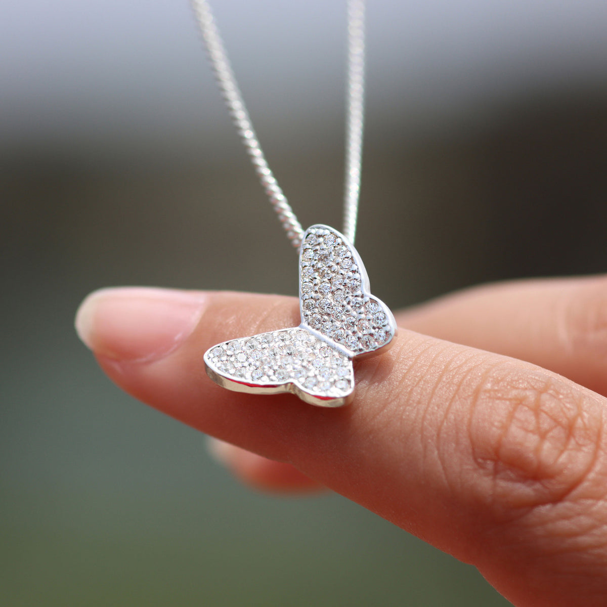 Butterfly necklace with circular cut