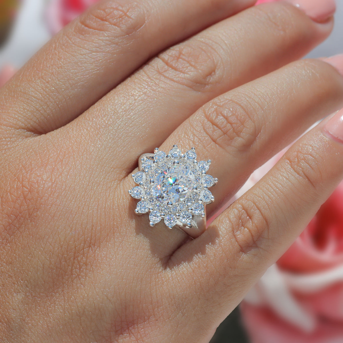 Anillo roseta con piedra central oval en plata 950