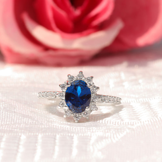 Anillo roseta con piedras en plata 950