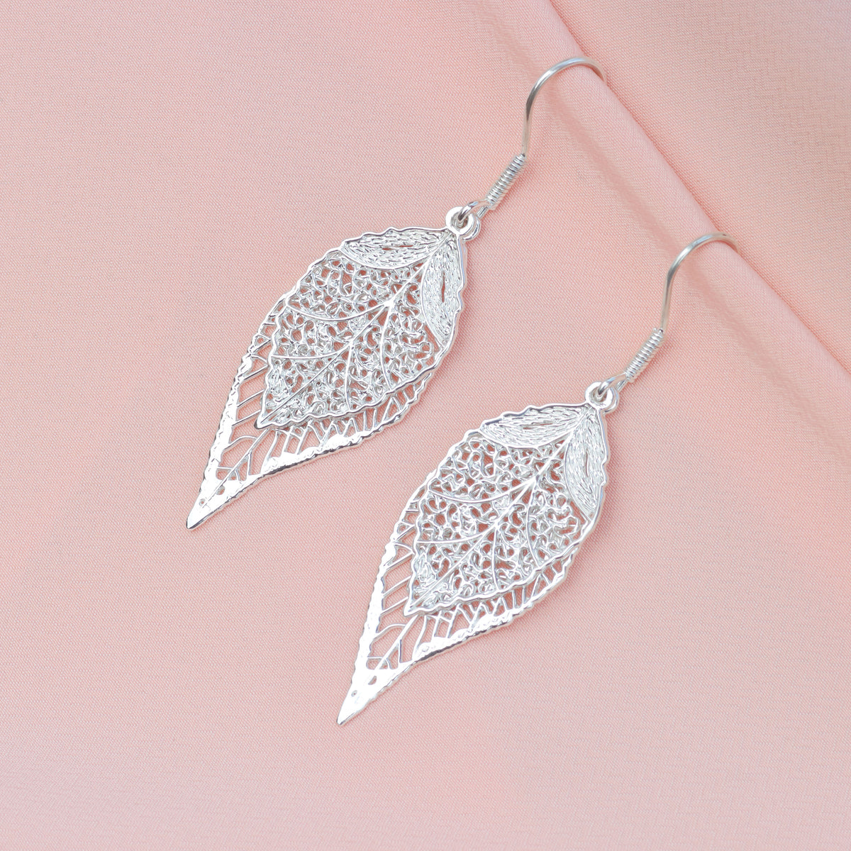 Aretes de hojas en plata 950