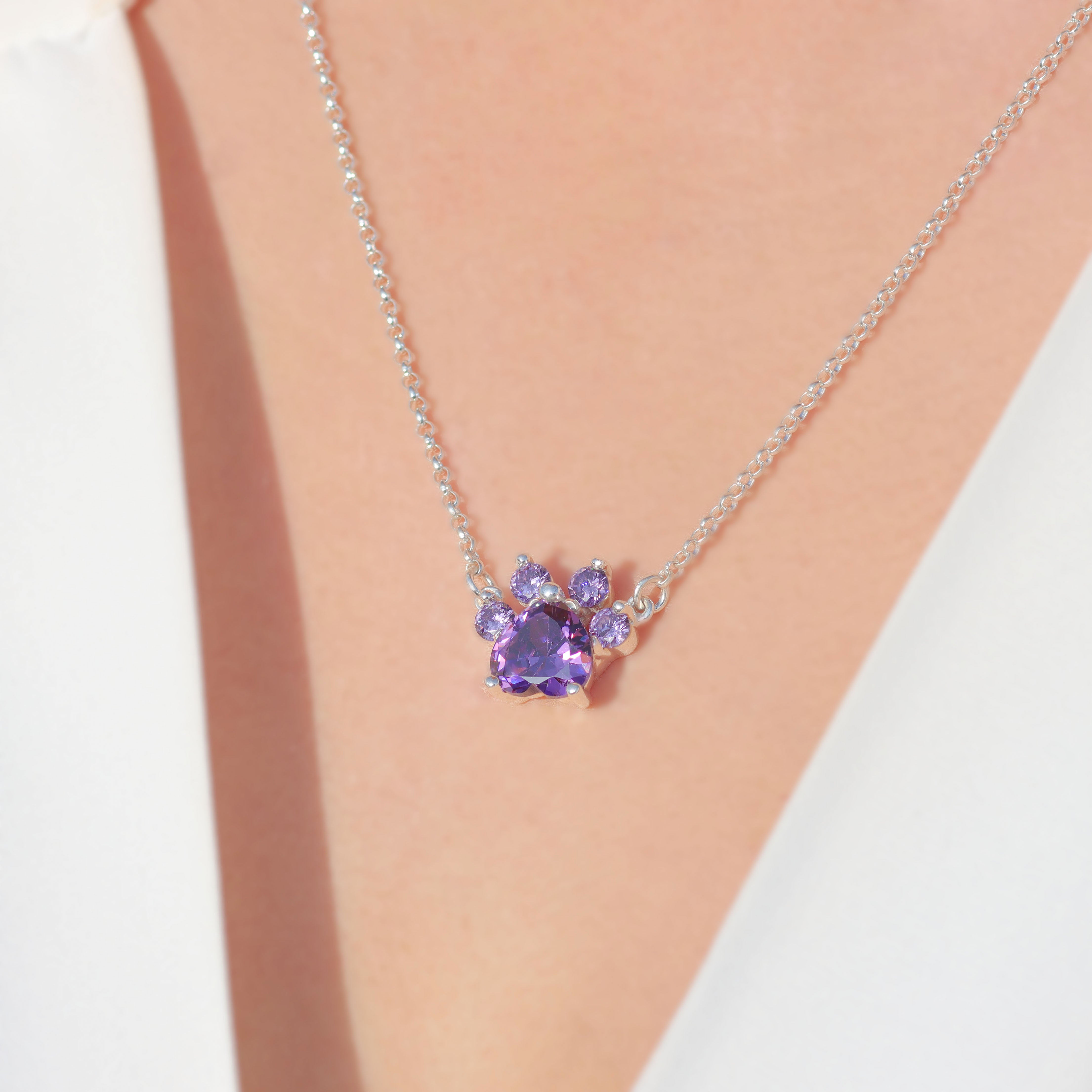 Paw print necklace with heart cut