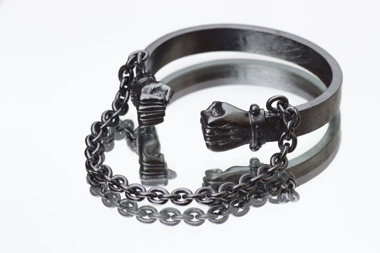 Pulsera de puños y cadena en plata 950