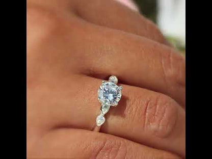 Anillo de gotas con piedra redonda en plata 950