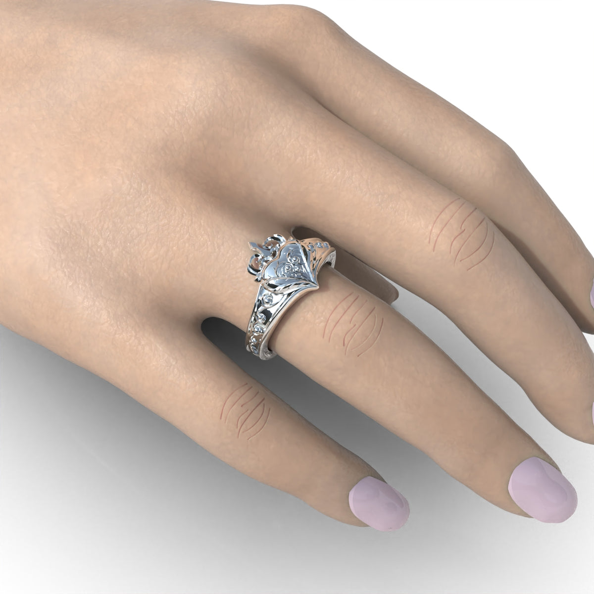 Anillo corazón con flor en plata 950